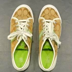 Coach women's canvas tennis shoes size 10.
